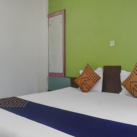SPOT ON 75667 Hotel Peacock Garden Lodge Kharakvasla Buitenkant foto